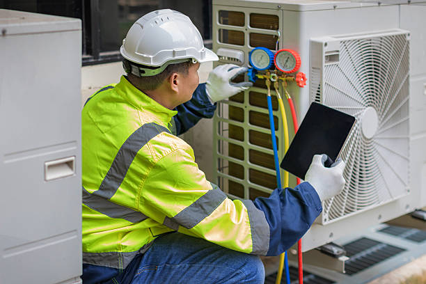 Professional Air Duct Cleaning technician working in Parsons, KS